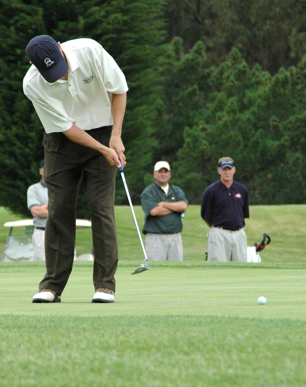 A golfer ready for hitting a tee shot